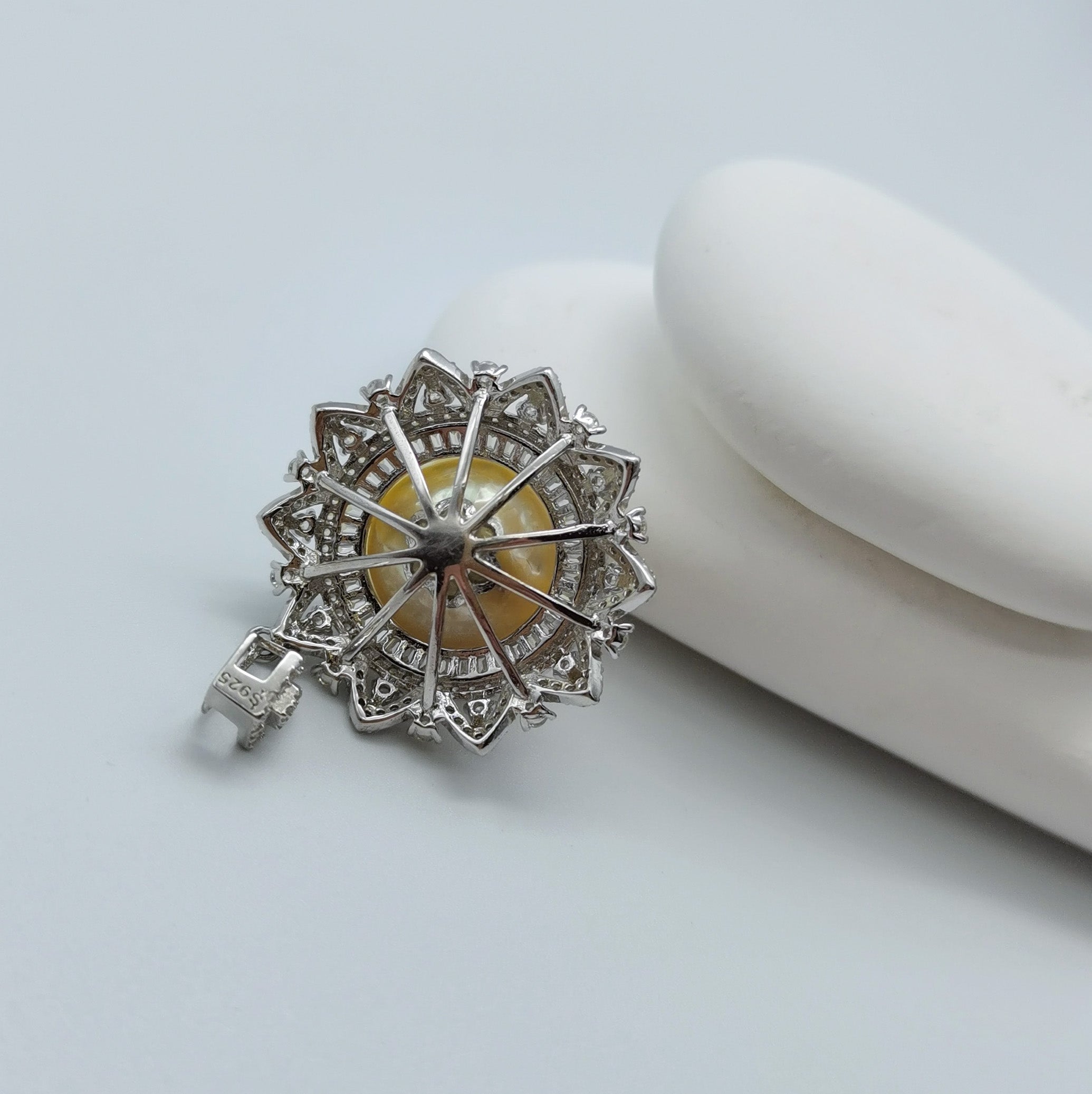 Gold South Sea pearl pendant back view showing compass lattice openwork design 925 sterling silver mount intricate detail