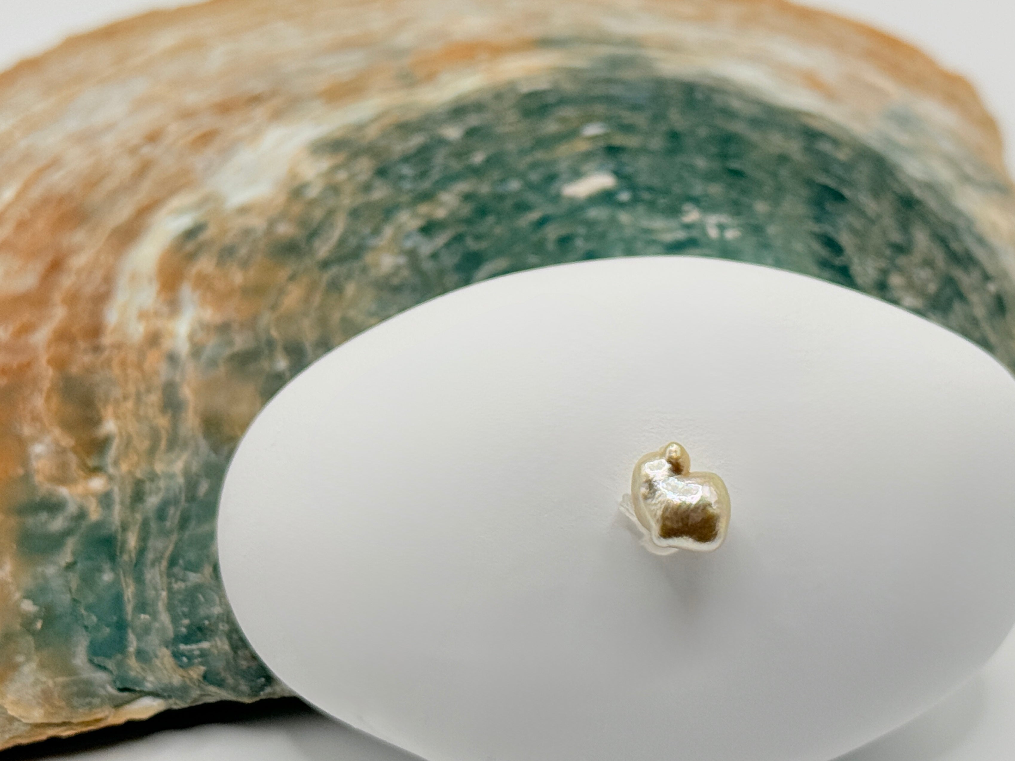 little bunny-shaped golden southsea keshi pearl