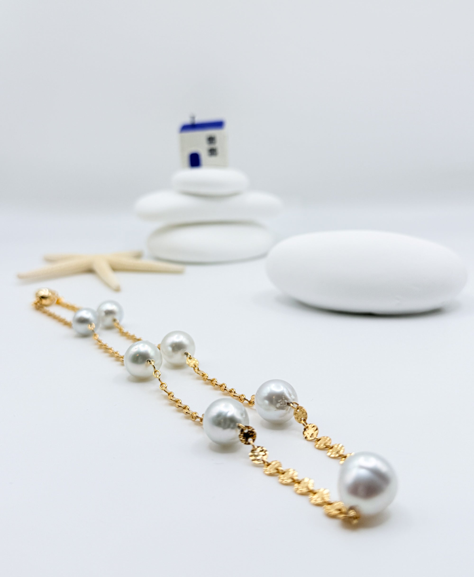 Aurora Mare South Sea pearl station necklace 45cm length showing 7 white circled pearls 11-13mm 14K gold filled textured chain full layout