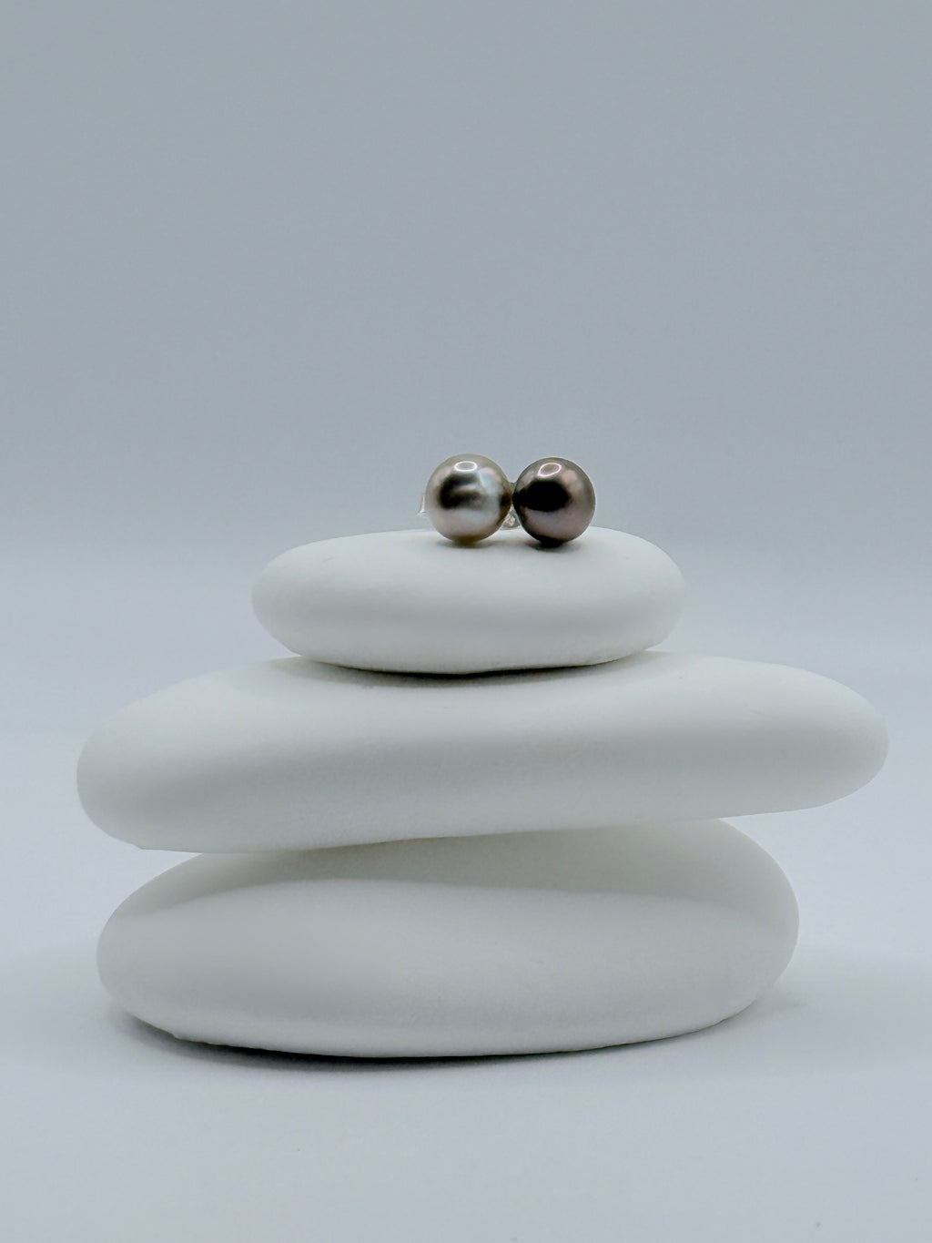 Sterling silver ear studs with contrasting silver and aubergine tone Gambier Island Tahitian keshi pearls on stacked white stones