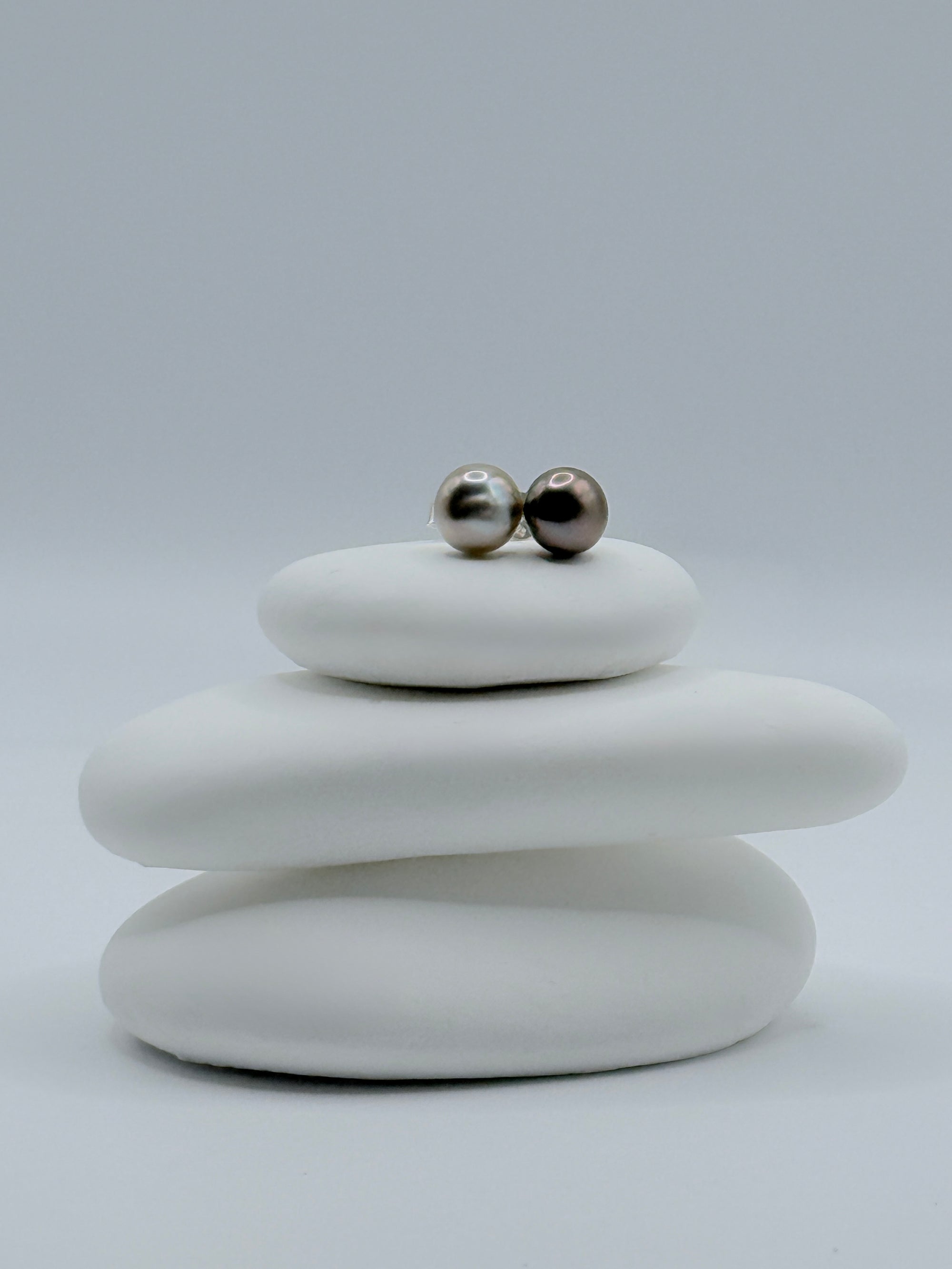 Sterling silver ear studs with contrasting silver and aubergine tone Gambier Island Tahitian keshi pearls on stacked white stones