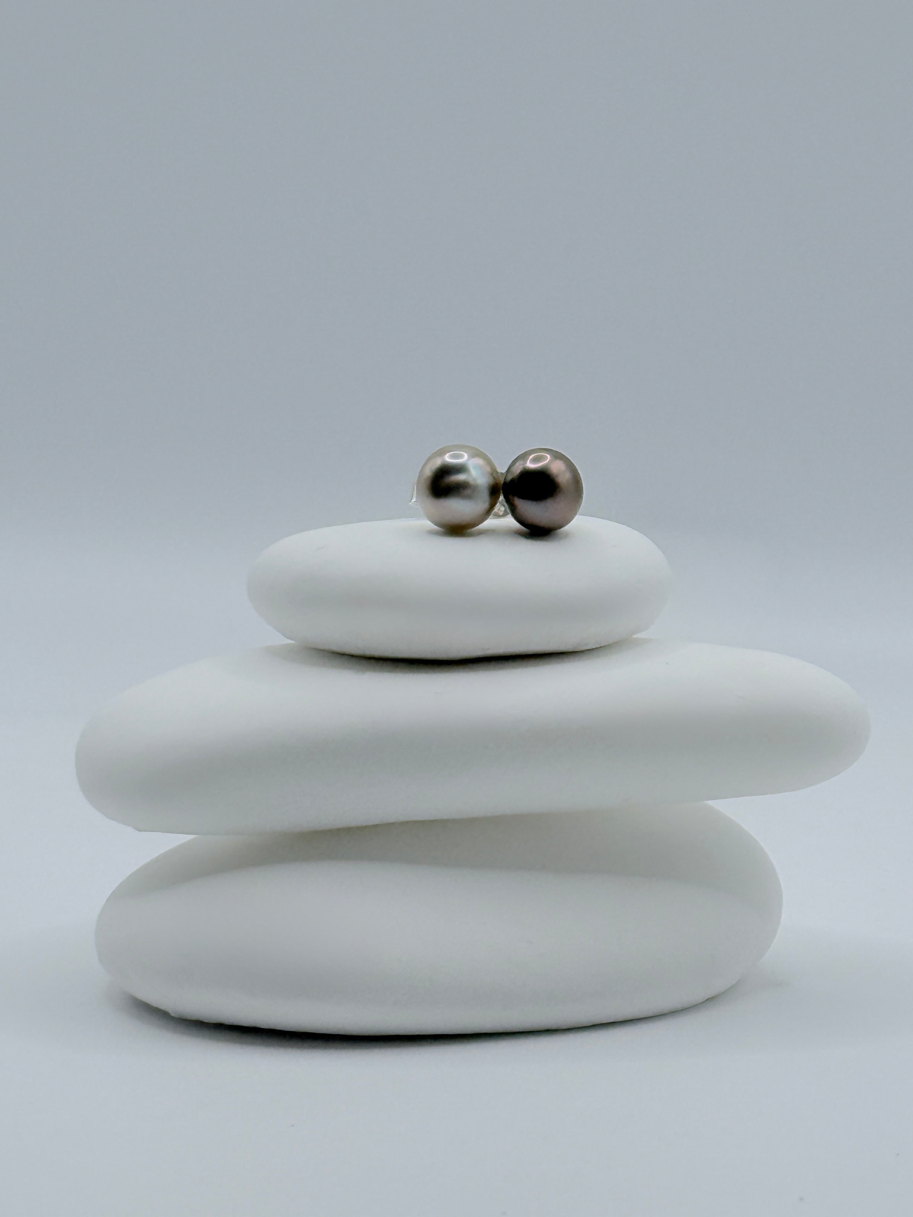 Sterling silver ear studs with contrasting silver and aubergine tone Gambier Island Tahitian keshi pearls on stacked white stones