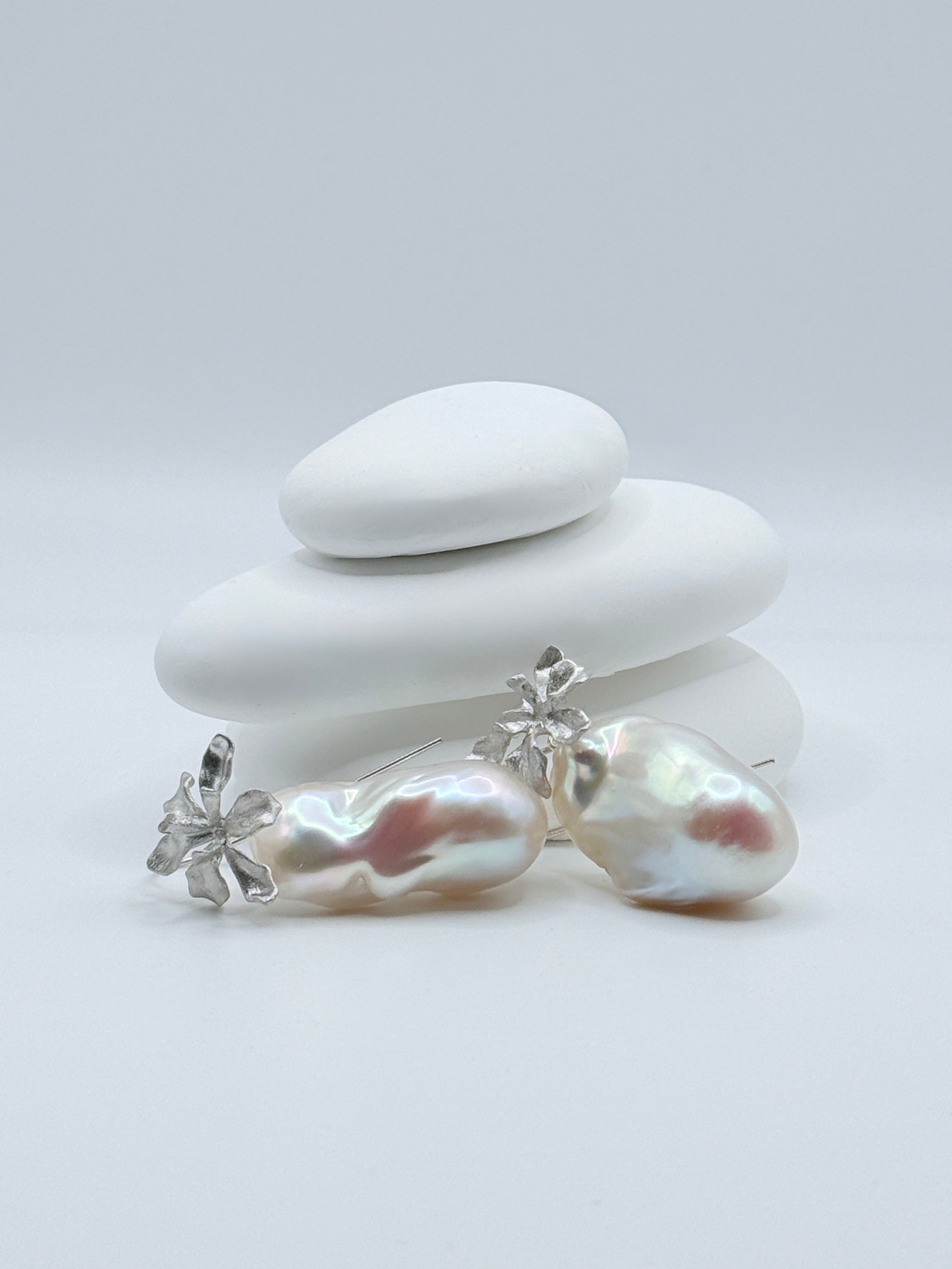 Sterling silver convertible earrings with 20x34mm baroque freshwater pearls displaying iridescent lustre and floral details on white stones