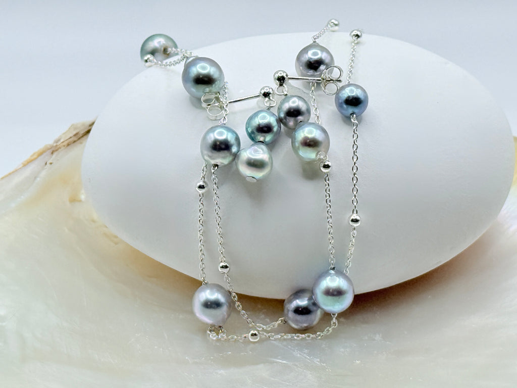 Blue baroque Akoya pearl drop earrings and station necklace set showing 9 pearls on 45cm chain with white shell styling