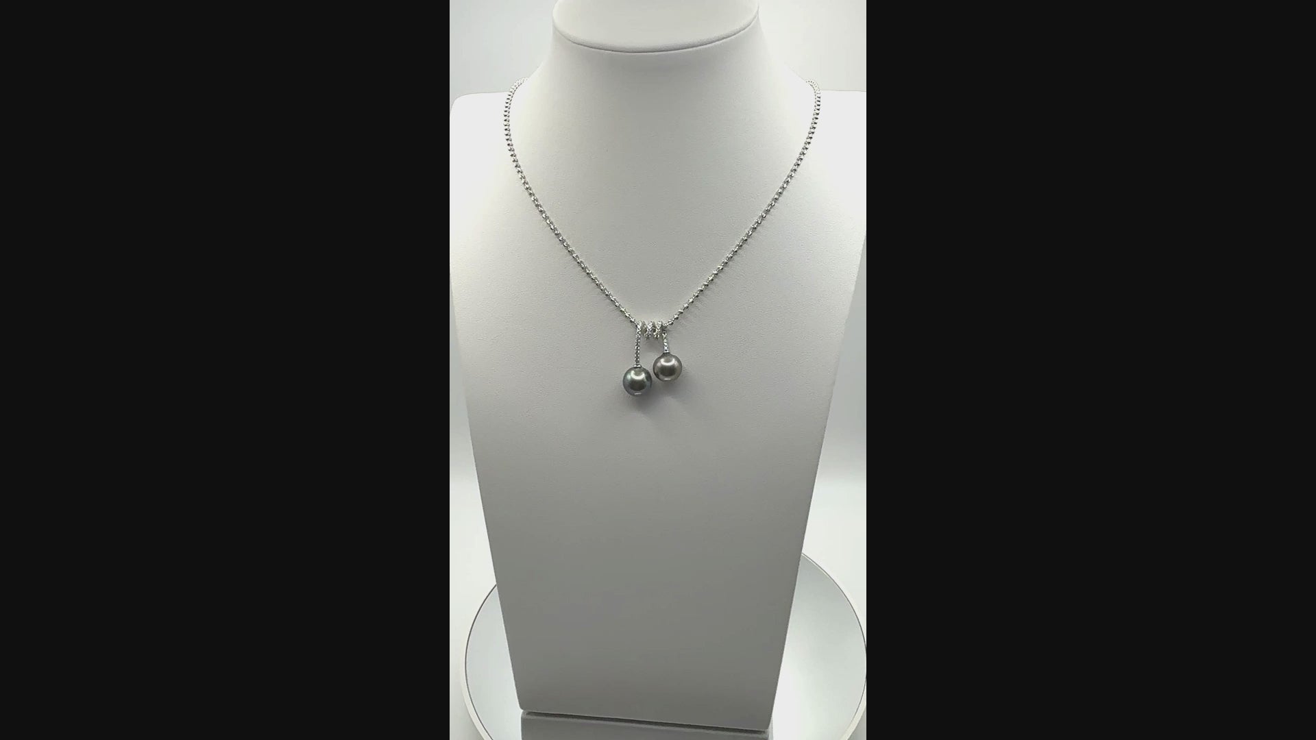 Video of CZ-accented double Tahitian pearl pendant necklace on 925 sterling silver ball chain.