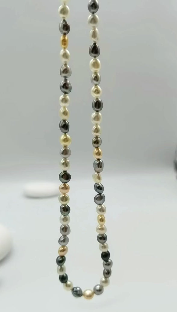 Video showing movement and natural colour variation of tri-colour Tahitian South Sea keshi pearl strand