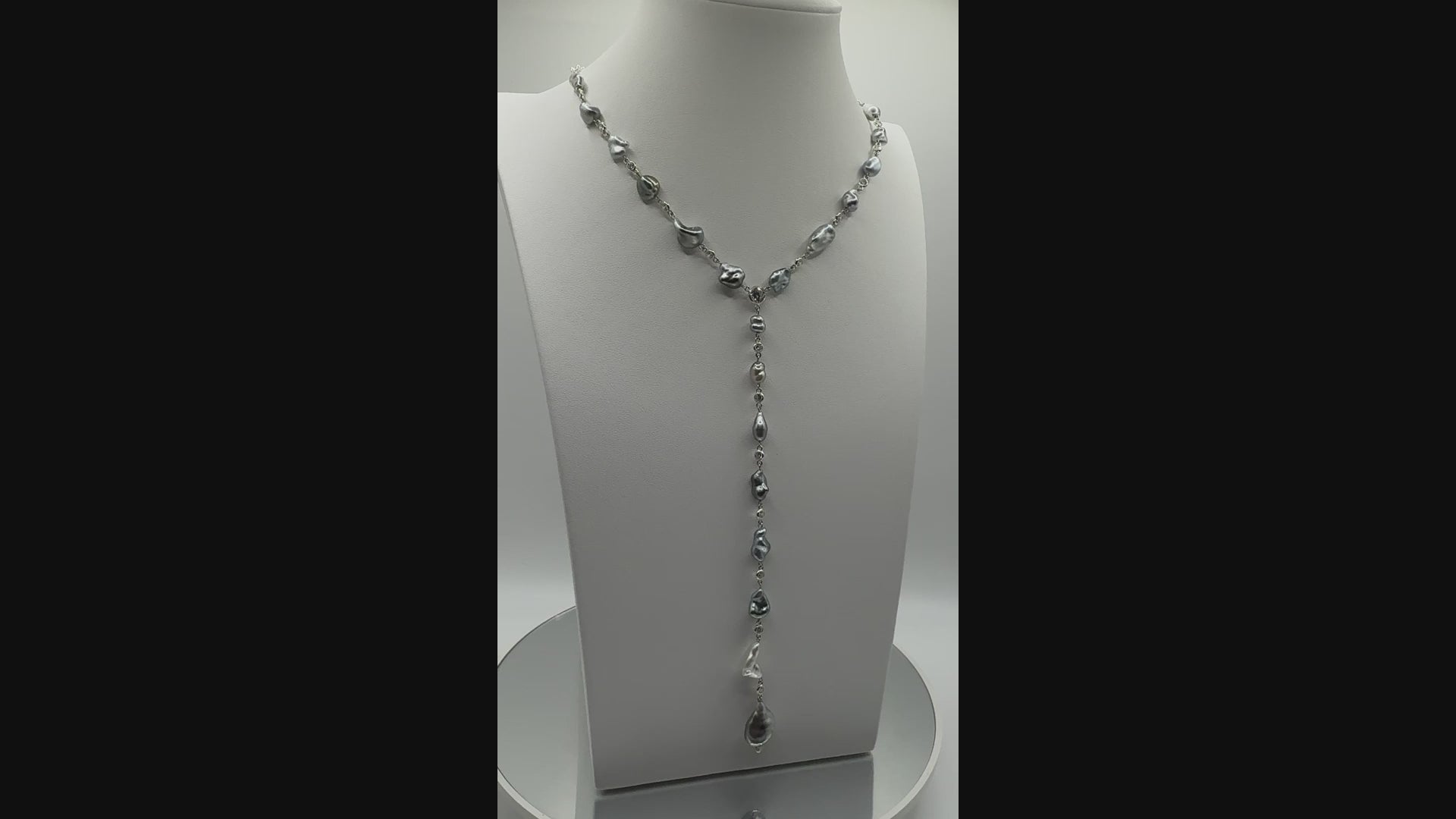 video of the necklace on a bust showing the style as worn