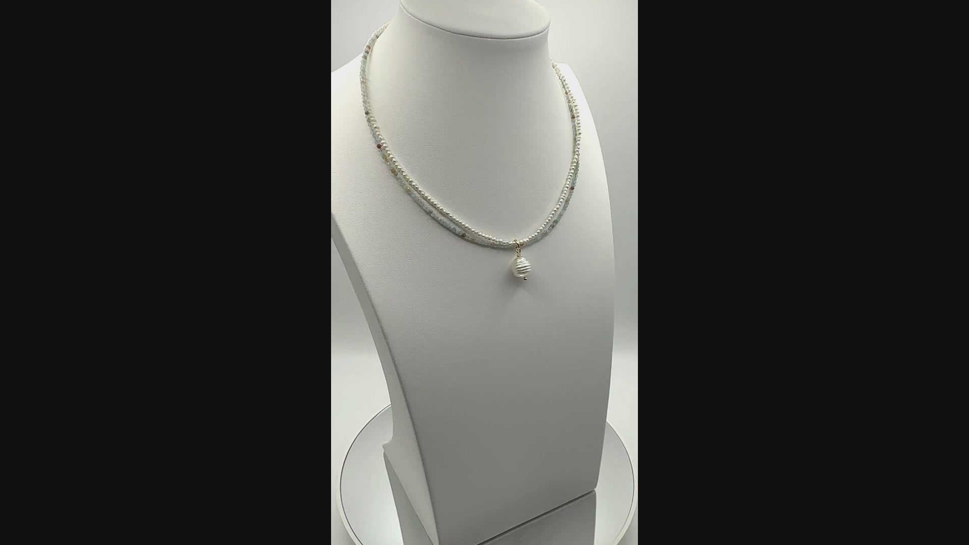 Video of South Sea pearl choker with seed pearls and amazonite beads, showing lustre and fluid movement of design.