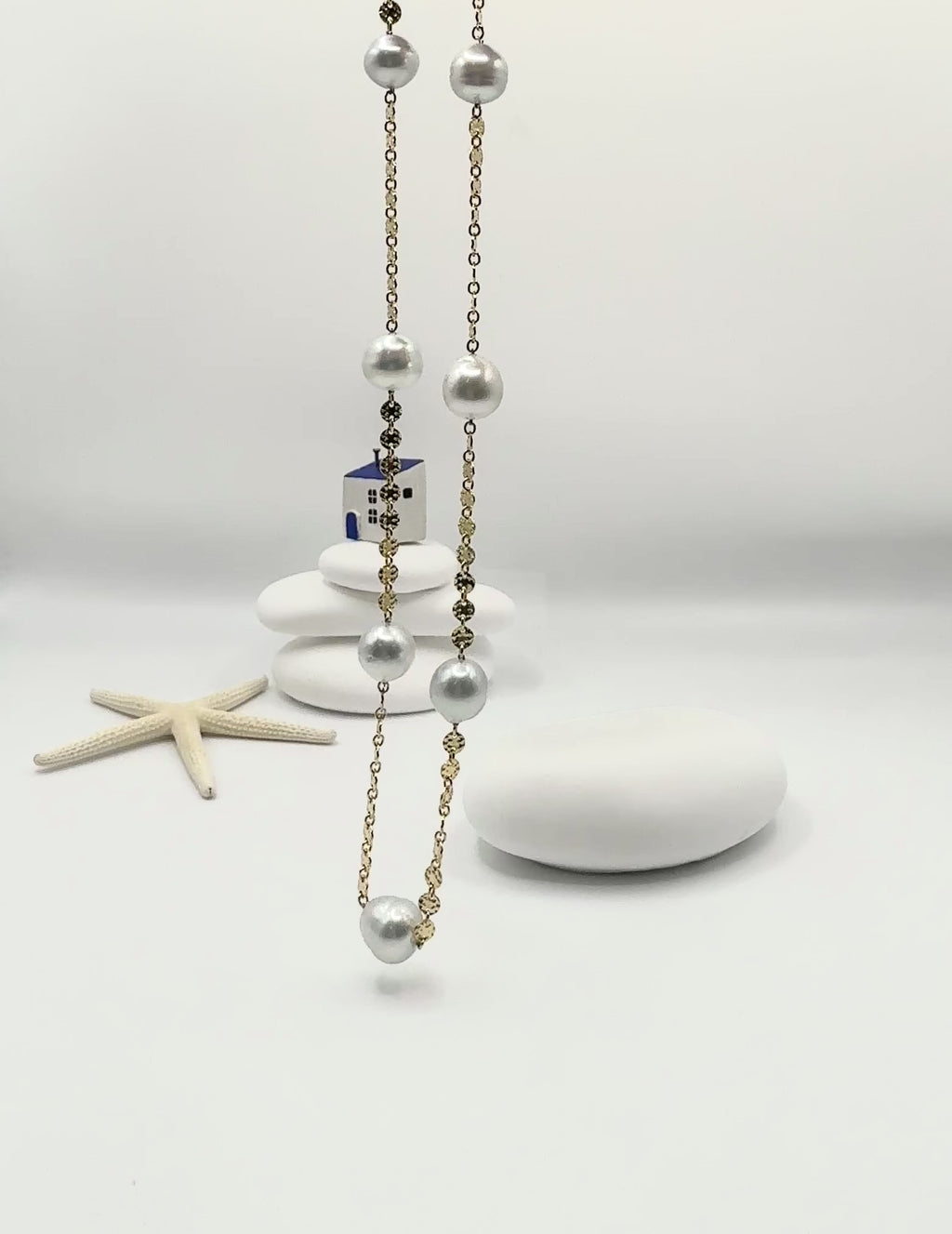 Aurora Mare white South Sea circled pearl station necklace 14K gold filled chain 45cm suspended showing natural movement and pearl lustre