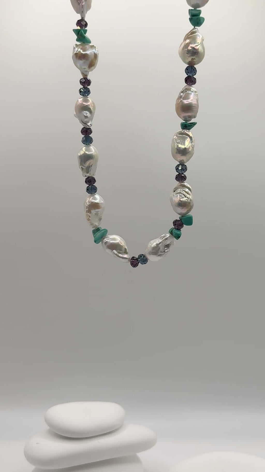 Video showing baroque pearl set movement highlighting natural lustre and crystal bead sparkle with turquoise colour contrast