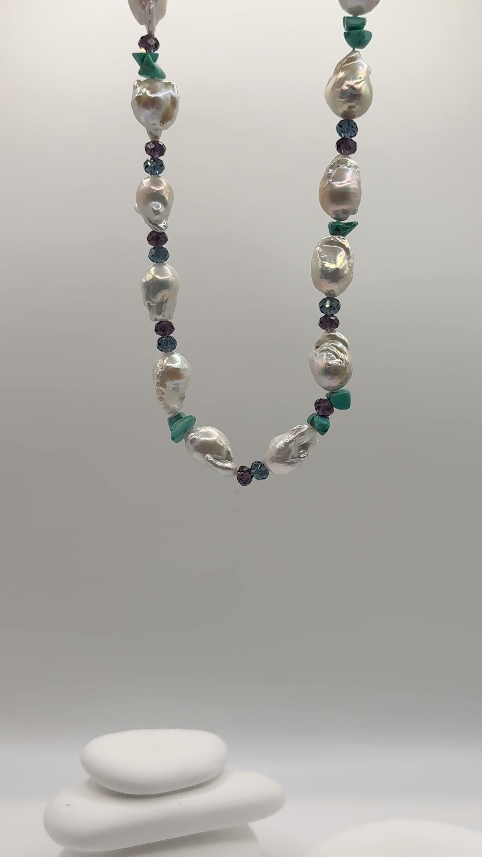 Video showing baroque pearl set movement highlighting natural lustre and crystal bead sparkle with turquoise colour contrast